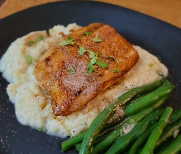a red snapper pan-seared on white mash and green beans, from Jono's instagram