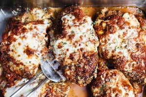 Chicken parmi with crispy browned cheese